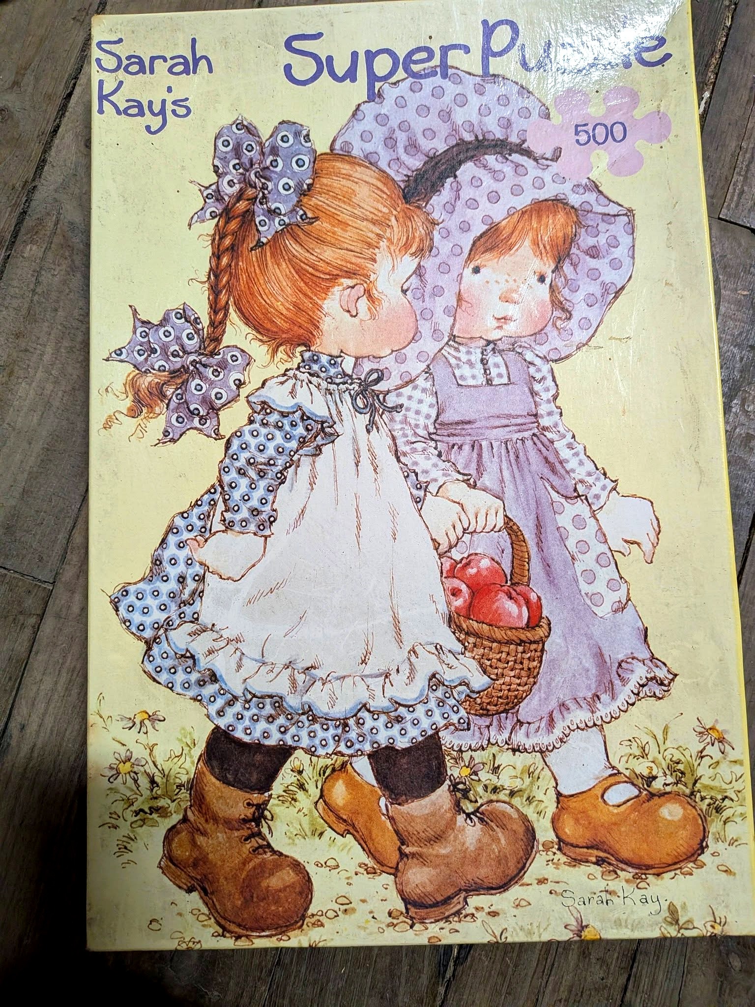 Sarah Kay : puzzles, broche et petits trésors — collection de Mireille — Sarah Kay’s Super Puzzle — boîte indiquant 500 pièces — vue 2.